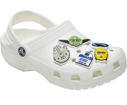 White clog shoe with Star Wars character charms on a white background