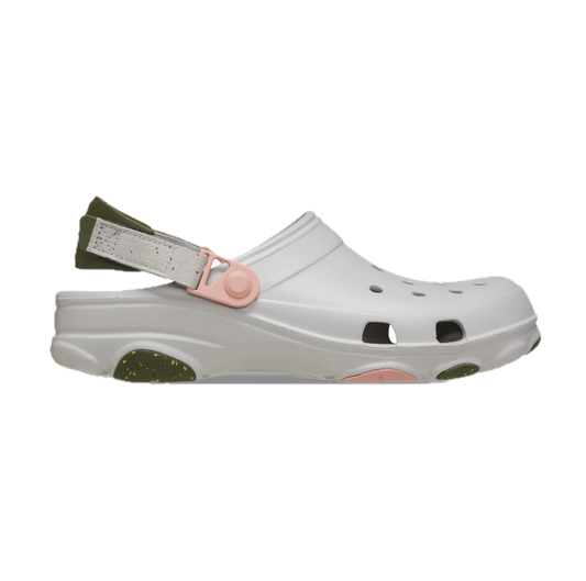 White clog shoe with colorful sole on a white background