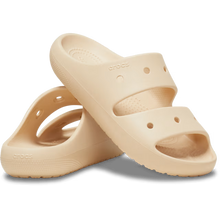 Load image into Gallery viewer, Beige sandals with 'Crocs' branding on a white background