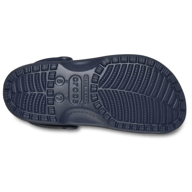 Navy blue shoe sole with brand logo on a white background