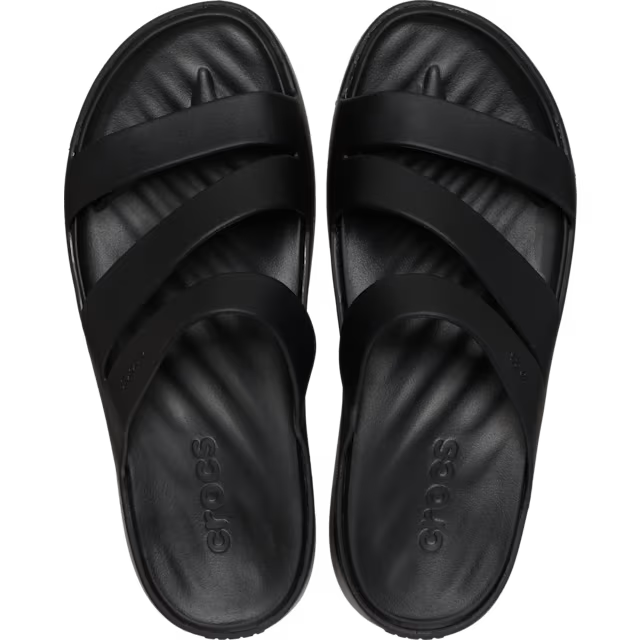 Black sandals with multiple straps on a white background