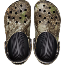 Load image into Gallery viewer, Pair of camouflage clogs with black soles on a white background