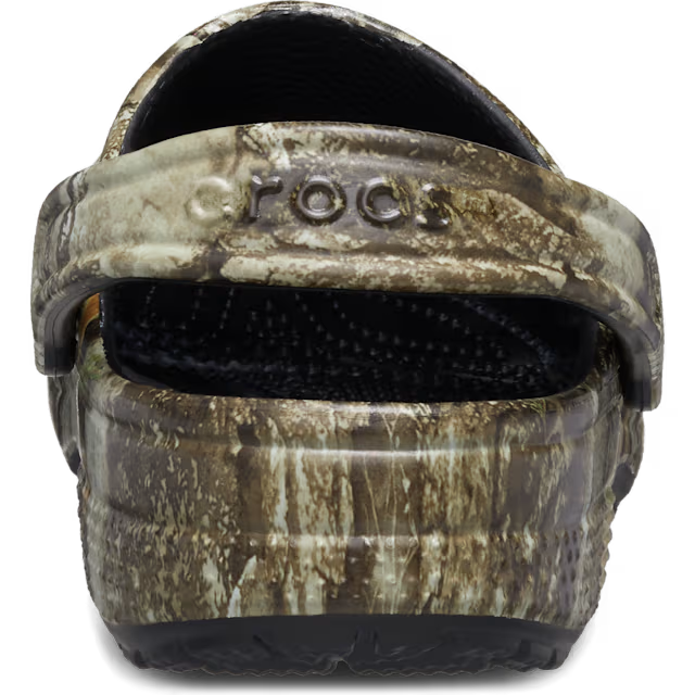 Camouflage-patterned clog shoe with 'Crocs' branding on a white background