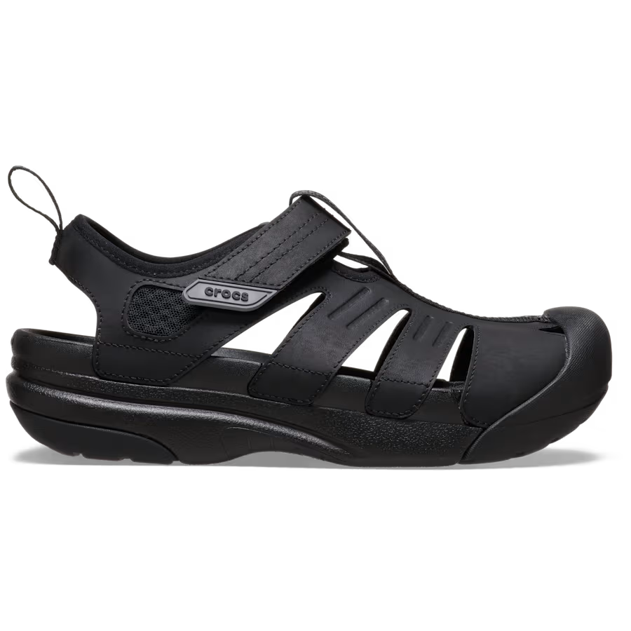 Black sandal with 'Crocs' branding on a white background