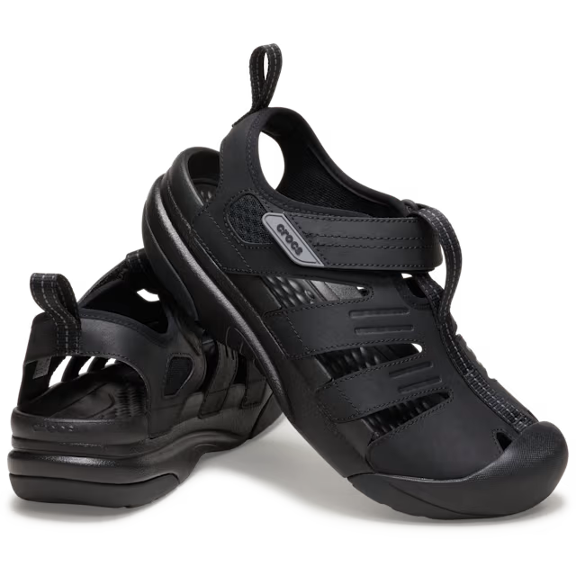 Black sandals with a brand logo on a white background
