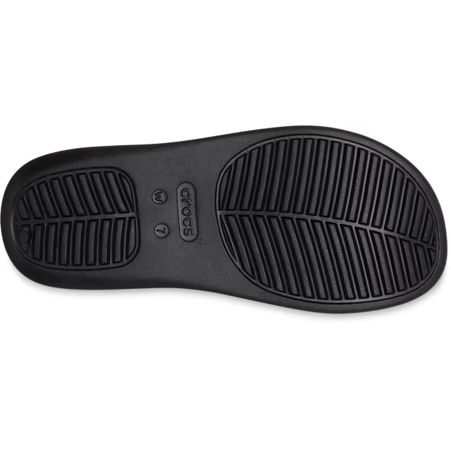 Black Crocs sandal sole on a white background