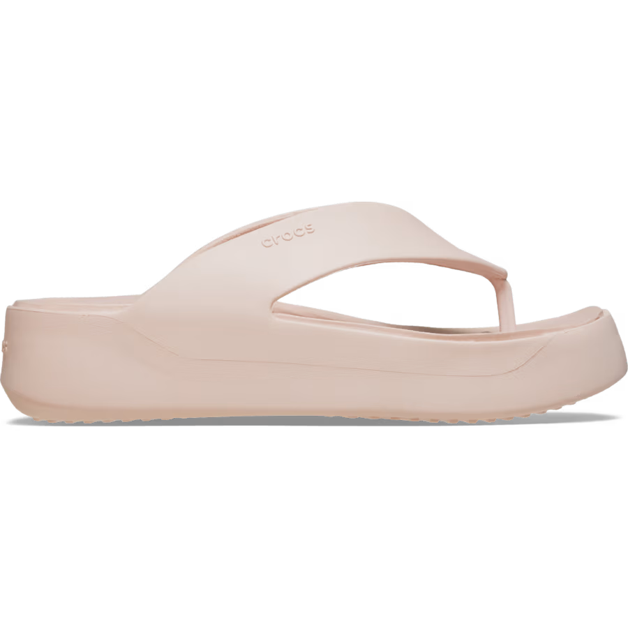 Beige sandal with 'Crocs' branding on a white background