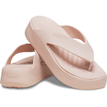 Load image into Gallery viewer, Pair of pink Crocs sandals on a transparent background